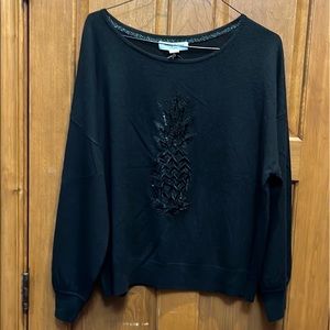 A new beautiful warm Tommy Bahama black top.